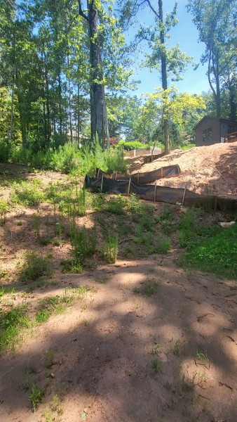Site grading and preparation for retaining wall project